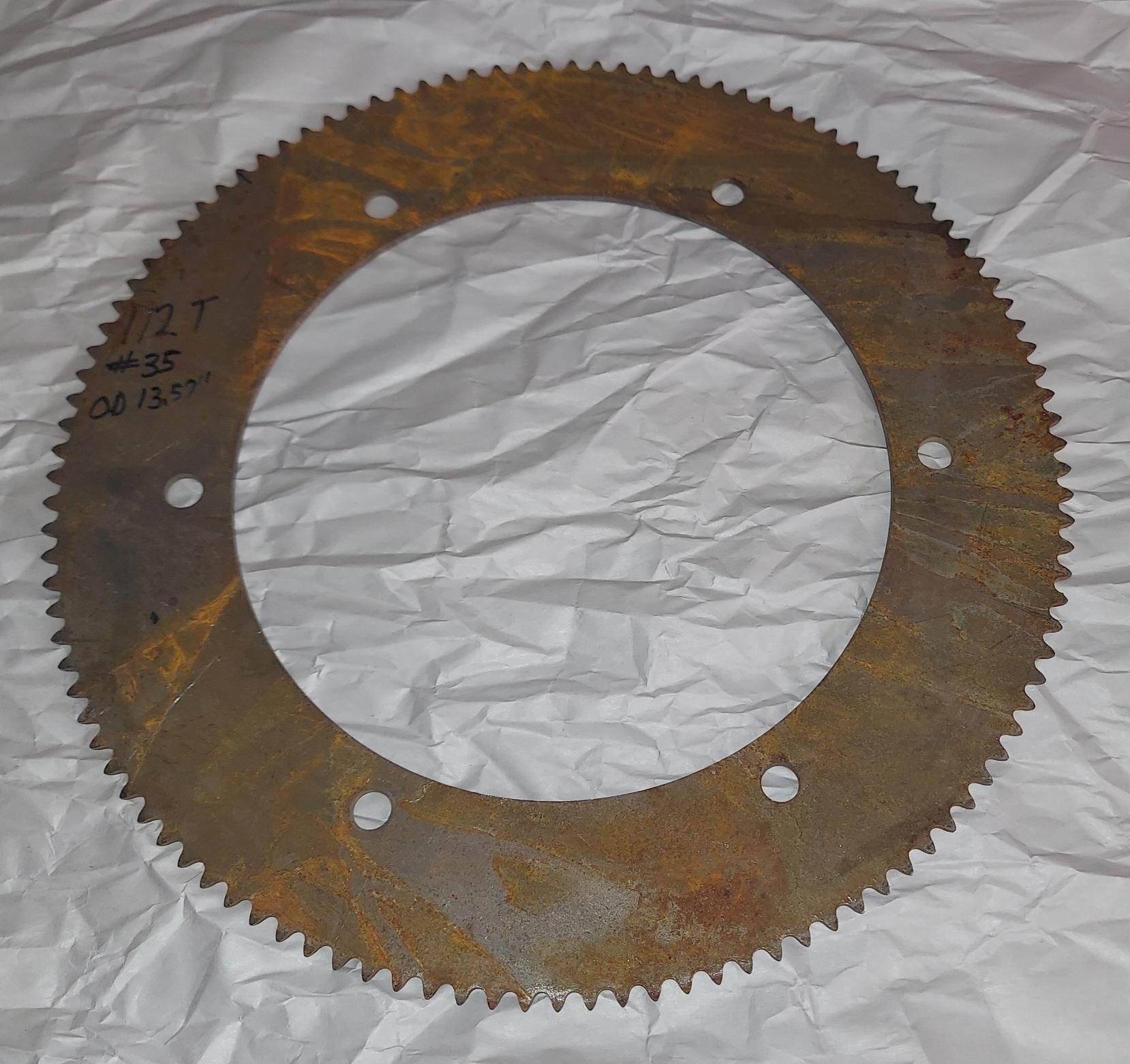 35 A 112 T approximate 13.57" OD x 8-3/4" ID with a 6 hole bolt pattern of 10" COH